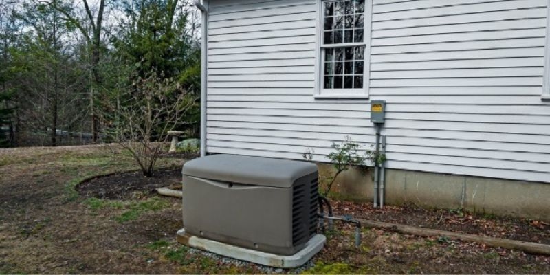 Generators installed in the backyard of a house. the picture is take at the sunset time 